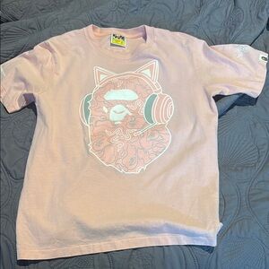 Pink Graphic T-Shirt with Headphone Design